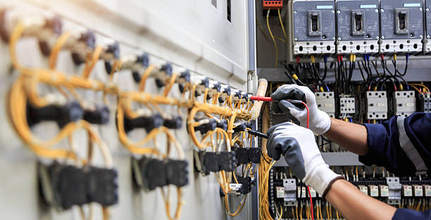 Professional Electrical Panel Upgrade technician working in Love County County, OK